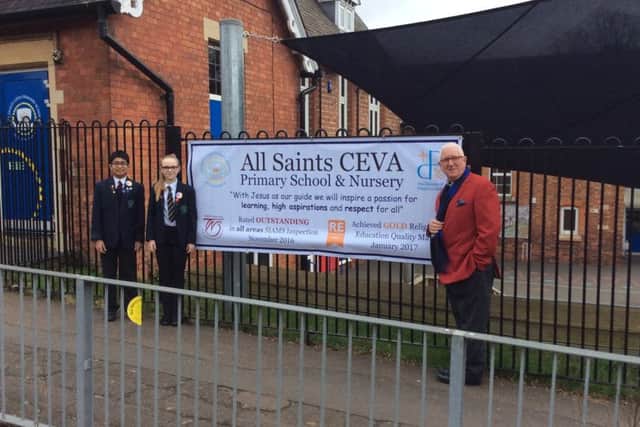 The banner at All Saints, which has since been taken down