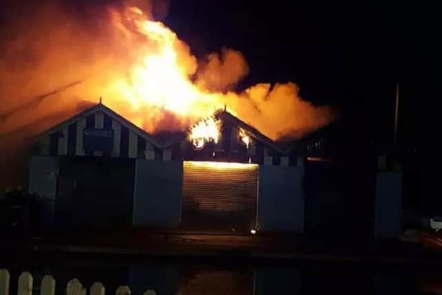 The fire which gutted the boathouse.