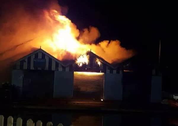 The fire which gutted the boathouse.