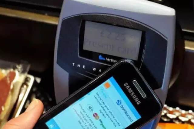 A contactless mobile phone payment