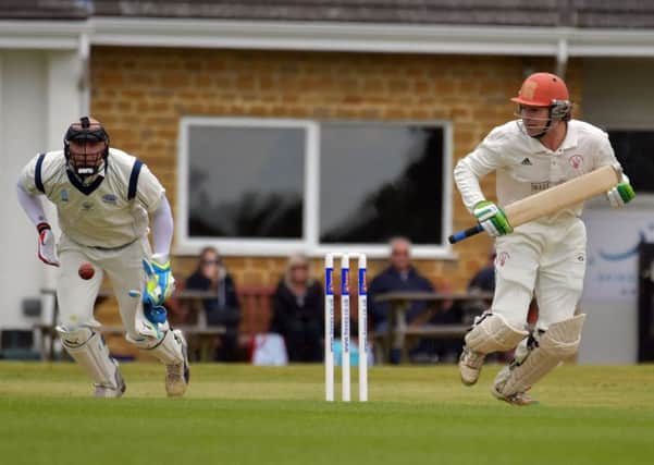 MAN IN FORM - Horton House's Jordan King on his way to 100 not out in his side's premier division draw with Rushden (Pictures: Dave Ikin)