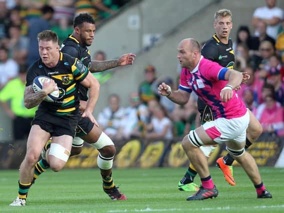Courtney Lawes was on hand to help Teimana Harrison as Saints pushed past Stade on Friday night (picture: Sharon Lucey)