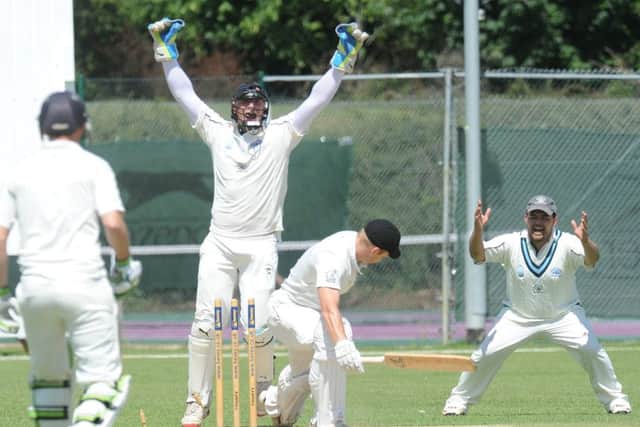 Wicketkeeper William Bates celebrates as Peterboroughs Alex Mitchell is bowled by Mudassar Hussain Ansari during Rushdens fine four-wicket success at Bretton Gate last weekend