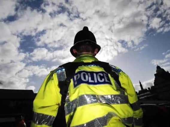 A man was assaulted and robbed in Balmoral Road