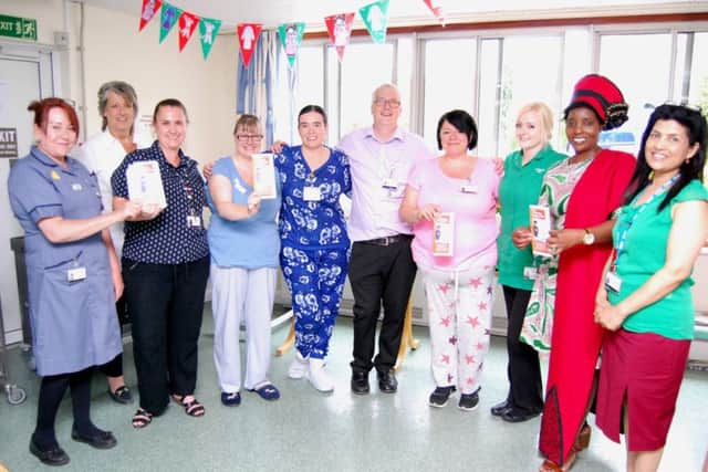 Wearing pyjamas at the July 4 launch event (centre) are Lamport and Twywell Ward Matron, Bridgette Stanforth, Clare Beattie, Lead Nurse for Medicine, and Deputy General Manager for Medicine, Dione Rogers, on July 4. NNL-170707-132034005