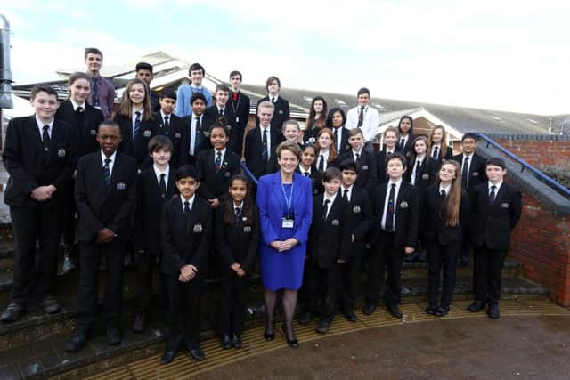 Executive Principal Victoria Bishop celebrating the school's outstanding Ofsted status in January, 2015. While the school was roundly praised in its last report, there are calls for the directors to justify the principal's Â£180k wage.