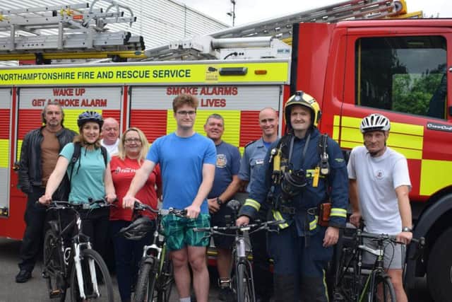 Paul Cushing (second from right) prepares to set off on his fundraising ride with (from left to right) sister-in-law Esme, son Reece and NFRS colleague Kev Hardwick outside Moulton station