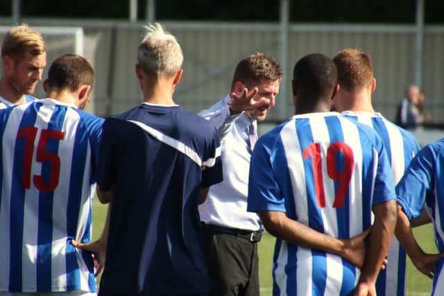 Marcus Law addresses his Poppies players after they beat Slough Town on the opening day of the Evo-Stik South League Premier season