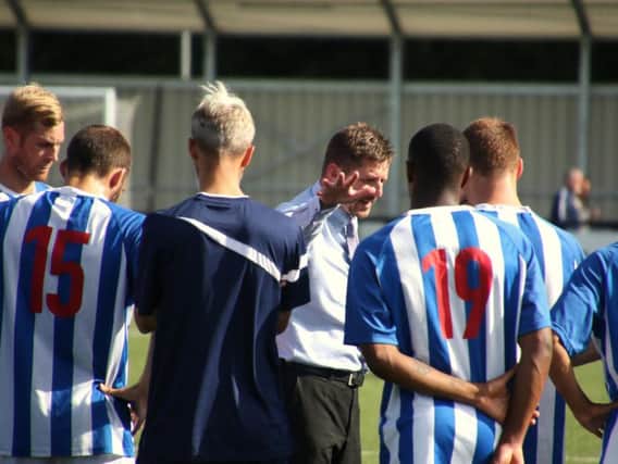 Marcus Law addresses his Poppies players after they beat Slough Town on the opening day of the Evo-Stik South League Premier season