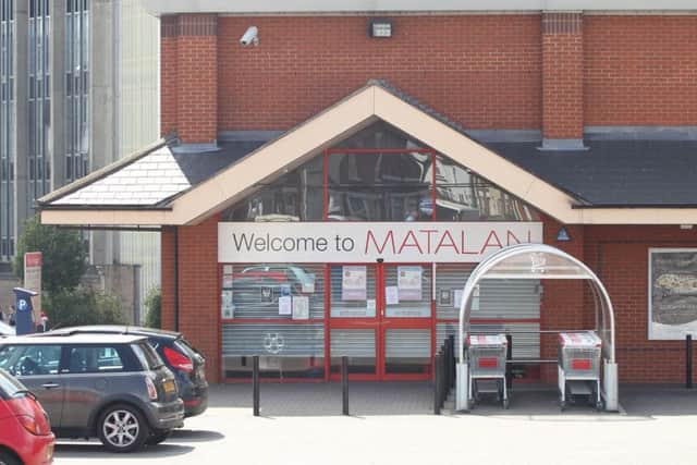 A woman was threatened at knifepoint outside Matalan in Wellingborough
