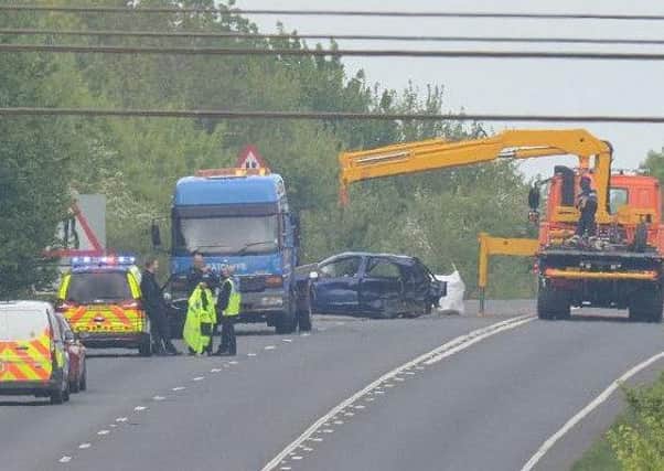 The emergenct services at the scene of a fatal collision on the A605