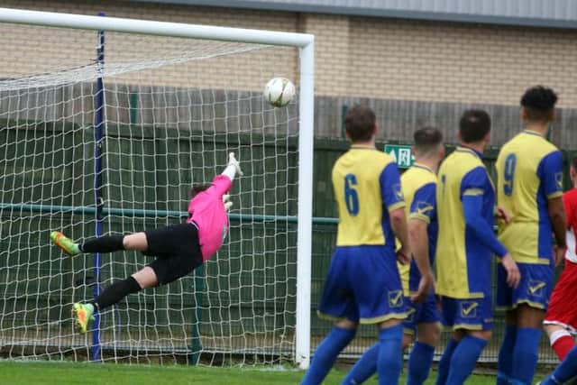 Jason Turner's free-kick finds the top corner