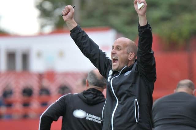 Assistant-manager Paul Lamb shows his delight after one of Diamonds' goals in the 2-2 draw at Alfreton