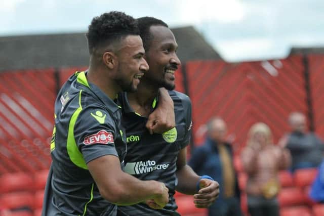 Nabil Shariff is congratulated by Luke Fairlamb after his goal