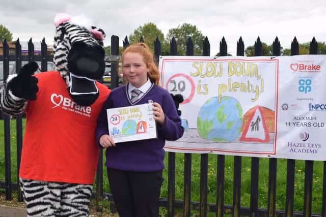 Alex Muir with Zak the Zebra