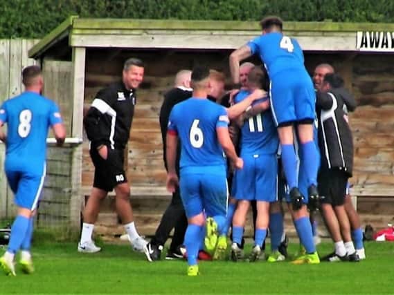There were jubilant scenes at Market Drayton Town last weekend as Corby Town hit back from a goal down to claim a 2-1 win. And David Bell is now hoping his team can kickstart their season. Picture by David Tilley