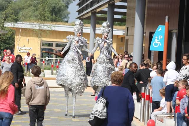 Entertainment at Rushden Lakes on its first day of opening to the public