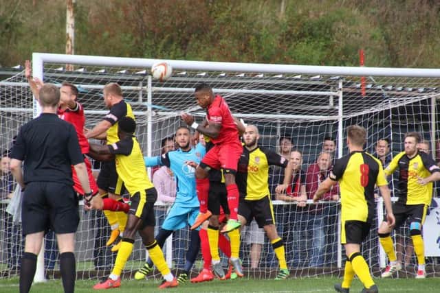 Aaron O'Connor heads home the Poppies' opening goal