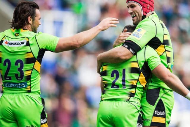 Christian Day congratulated Cobus Reinach after the scrum-half scored Saints' sixth try (pictures: Kirsty Edmonds)