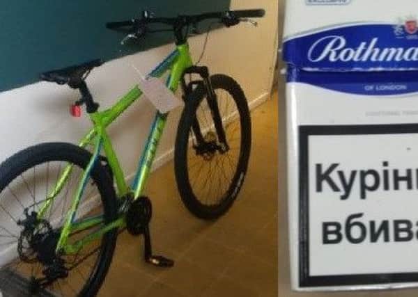 The bike the man was riding and the cigarettes found on him. NNL-170210-132636005