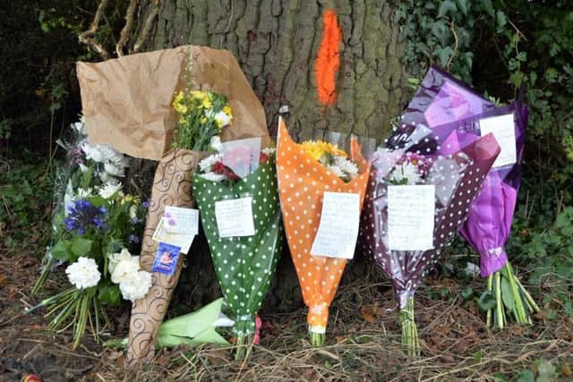 Flowers left at the scene of the Dingley crash where two workers from Fairline died NNL-140110-120451001