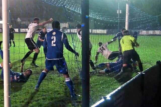 Phil Trainer forces home Corby Town's dramatic late winner in Wednesday's 2-1 success at Kidsgrove Athletic. Picture by David Tilley