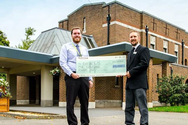 The cheque is handed over.