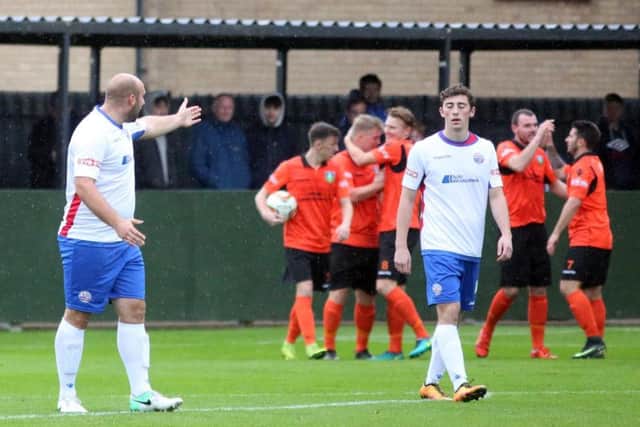 The inquest begins following one of Kidsgrove's goals as Diamonds slipped to a 3-1 defeat at Hayden Road