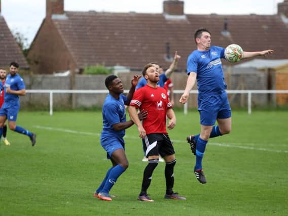 Action from Irchester United's 3-2 defeat to Harrowby United in the UCL Knockout Cup last weekend. Picture by Alison Bagley