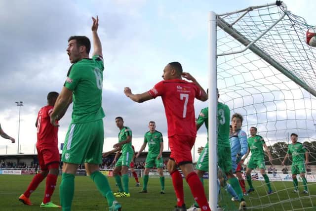 Michael Richens' shot finds the net to give the Poppies the lead at Nantwich