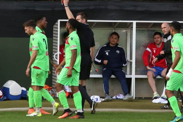 Egham's Rhys Paul is sent-off for a second bookable offence during the goalless draw