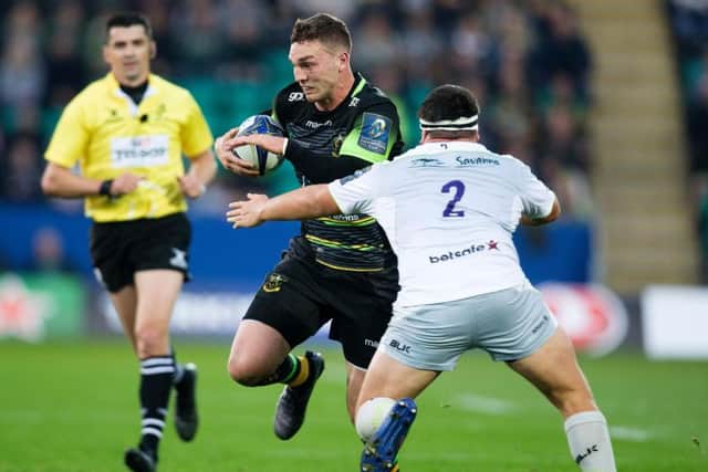 George North was forced off during the first half of Saints' defeat to Saracens (picture: Kirsty Edmonds)