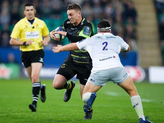 George North was forced off during the first half of Saints' defeat to Saracens (picture: Kirsty Edmonds)