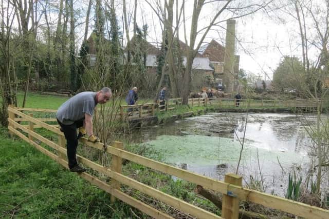 Volunteers helping out at Desborough Pocket Park at a previous event