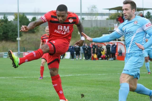 This effort from Aaron O'Connor was saved by Slough goalkeeper Jack Turner