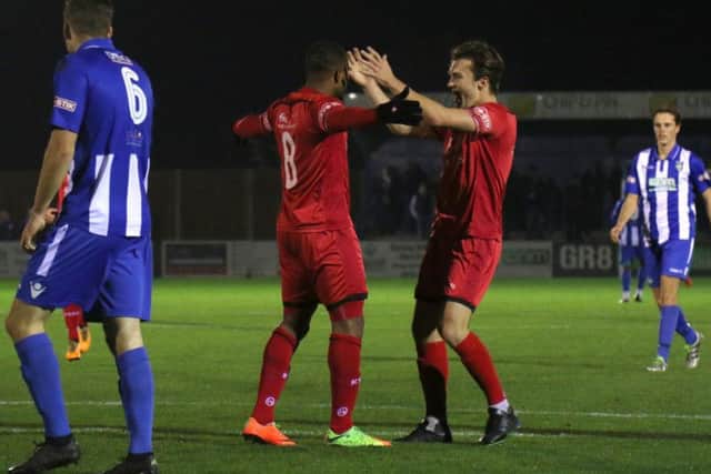 Aaron O'Connor is congratulated by Ben Milnes after he gave Kettering Town the lead in their 2-0 success at Bishop's Stortford. Pictures by Peter Short