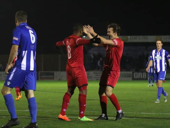 Aaron O'Connor is congratulated by Ben Milnes after he gave Kettering Town the lead in their 2-0 success at Bishop's Stortford. Pictures by Peter Short