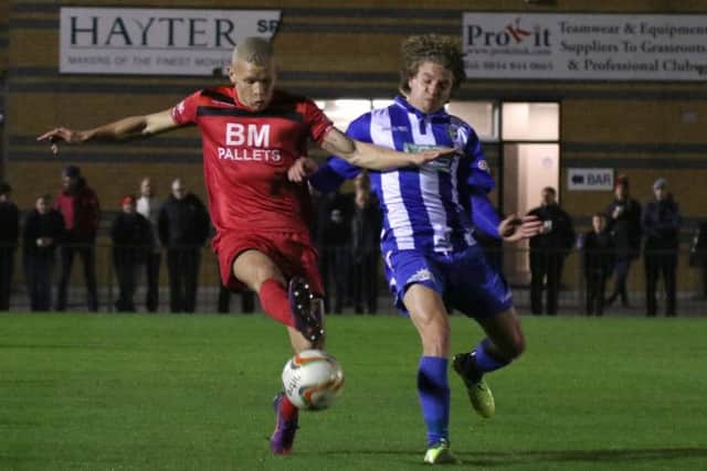 Lindon Meikle gets on the ball during Kettering's win at Bishop's Stortford