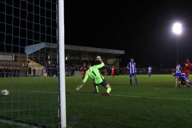 Aaron O'Connor scores his 11th goal of the season as he gave the Poppies the lead in Tuesday's 2-0 win at Bishop's Stortford. Picture by Peter Short