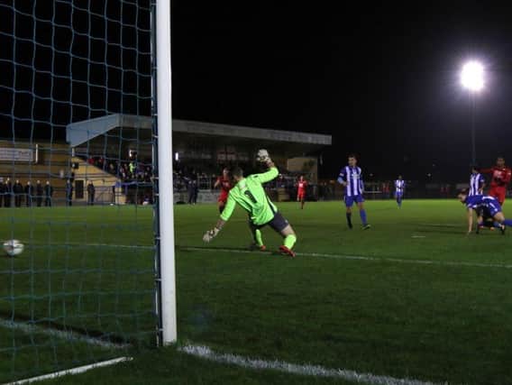Aaron O'Connor scores his 11th goal of the season as he gave the Poppies the lead in Tuesday's 2-0 win at Bishop's Stortford. Picture by Peter Short