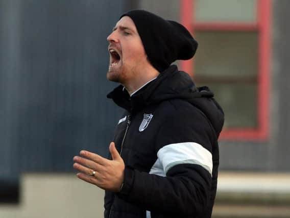 Caretaker-manager Steve Kinniburgh gives out some instructions during Corby Town's big 5-0 win over Belper Town at Steel Park. Pictures by Alison Bagley