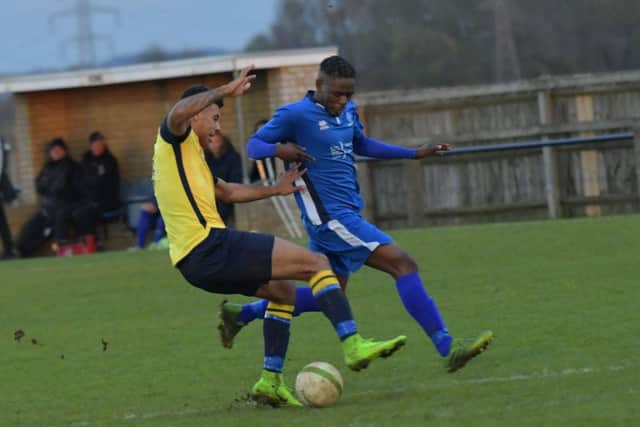 Action from Whitworth's 2-1 defeat at Cogenhoe United in the United Counties League Premier Division last weekend. Picture by Dave Ikin
