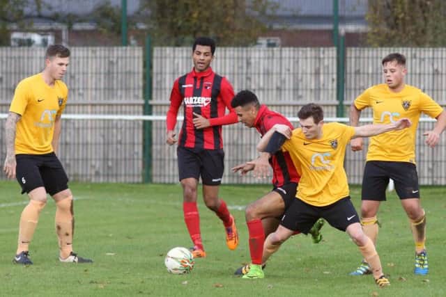 Action from Whitworth's 3-1 home loss to Harborough Town last weekend. The Flourmen bounced back with a 2-2 draw at ON Chenecks on Wednesday