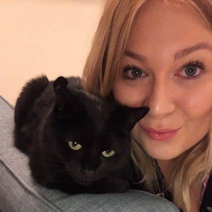Raphael at home with his new owner Ashleigh