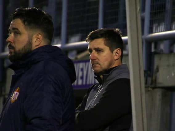 Kettering Town boss Marcus Law's expression tells the tale during his side's defeat at Dorchester